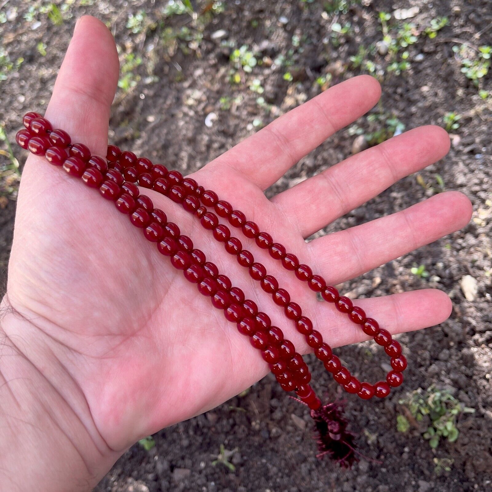 Antique Cherry bakelite rosary, 99 pearls, 28 g Total length 47 cm Rare