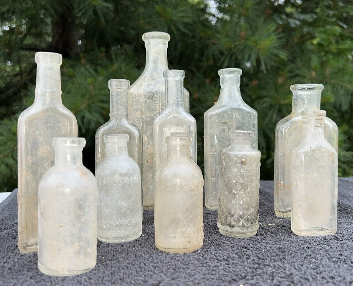 Lot of 11 Vintage Old Bottles Clear Plain Embossed Medicine Bottles