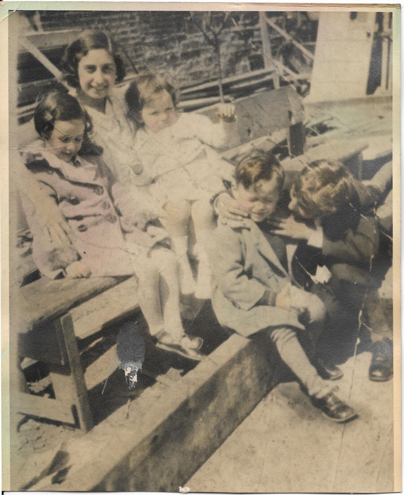 vintage tinted colored photo woman kids boys girls sitting on bench