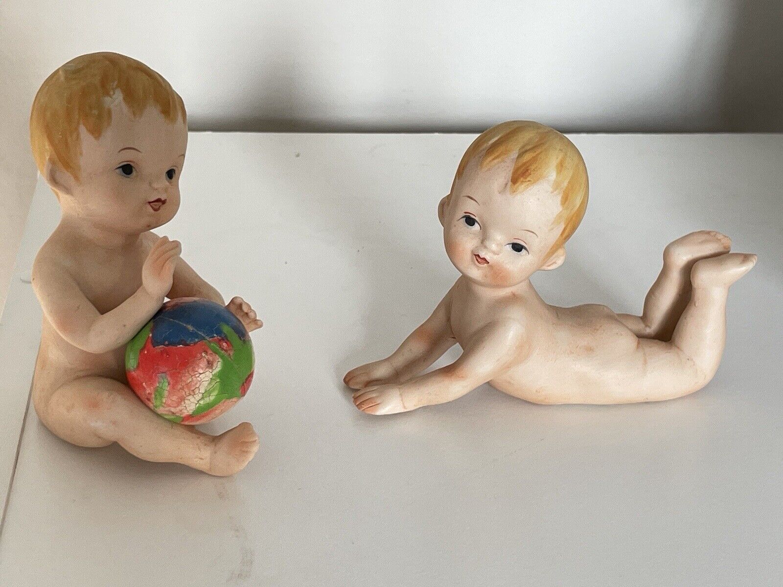 Lot 2 Vintage naked Baby Boy Porcelain Bisque Piano Figurines cute faces EUC