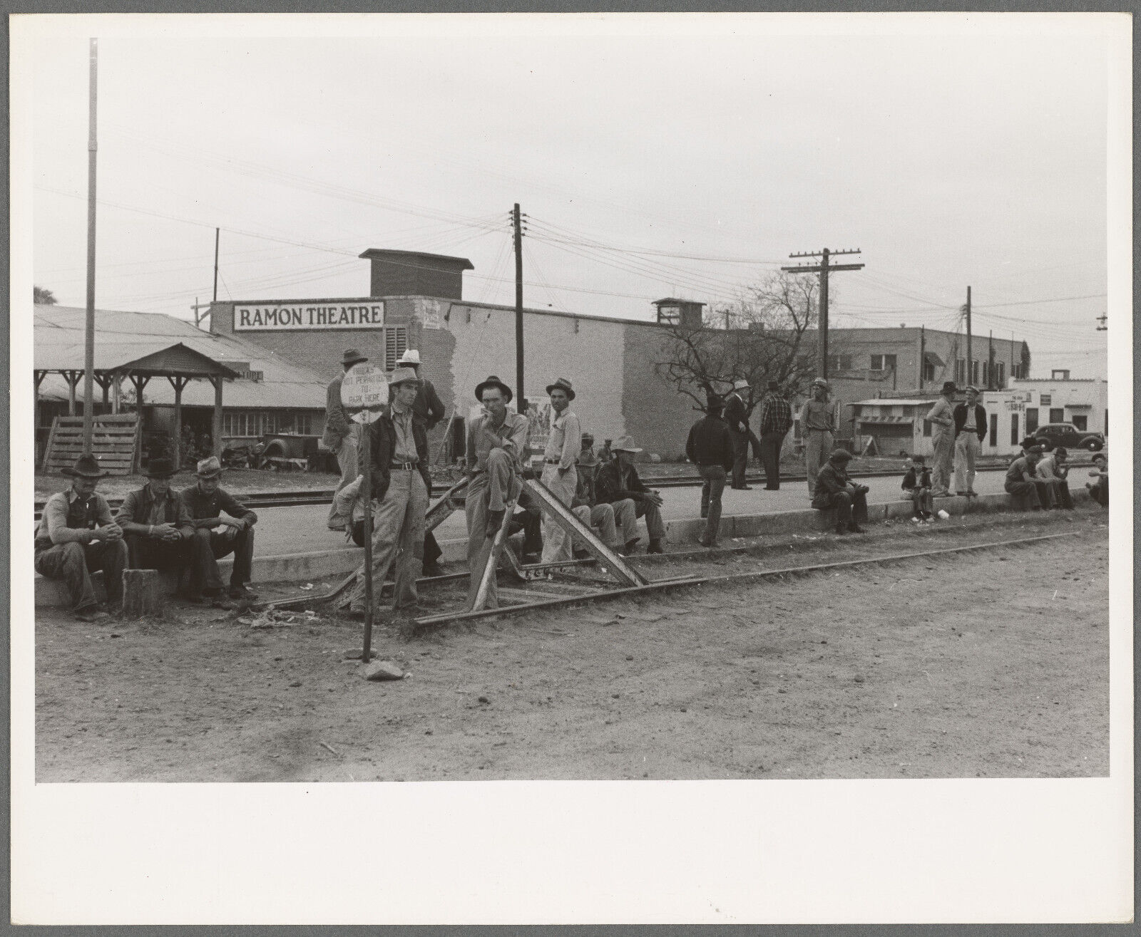 Photo, 1930\'s Day laborers waiting to be assigned to work, Raymondville, TX