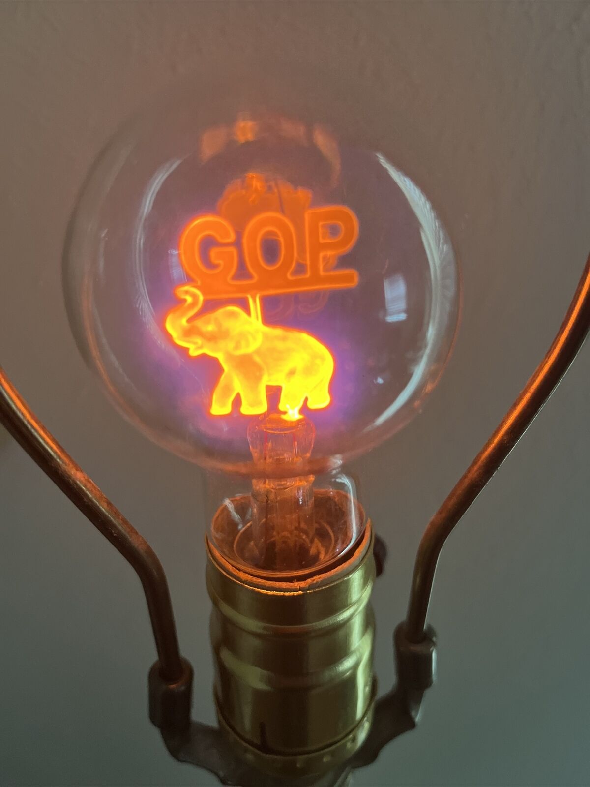 Vintage Aerolux Light Bulb GOP Elephant Republican Party Works Glows Orange