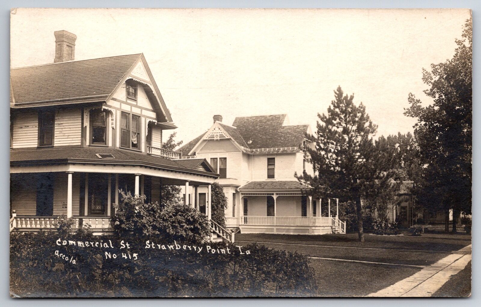 Strawberry Point Iowa~Commercial Street No 415~Victorian Homes~c1910 RPPC