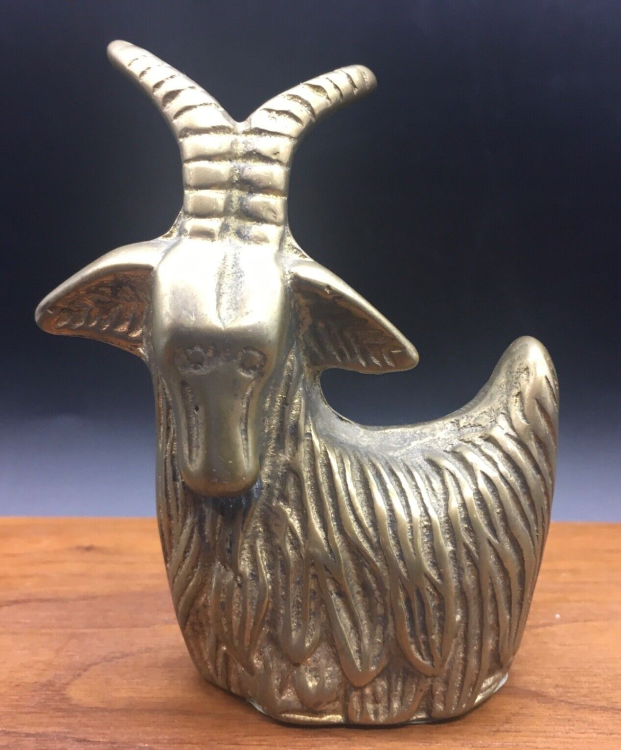 Brass vintage sitting goat figurine with long horns 3.5” X 3” green felt bottom