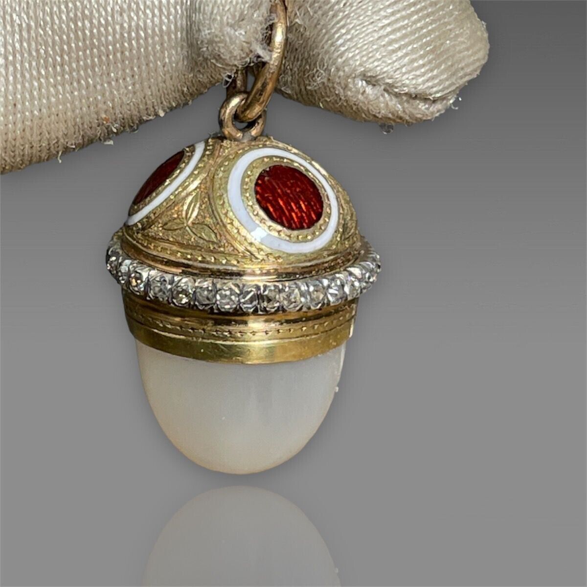 Antique  Faberge diamond moonstone 56 gold egg pendant, 