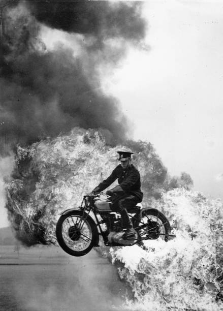 Jump with a motorcycle through a wall of fire 1935 Old Historic Photo