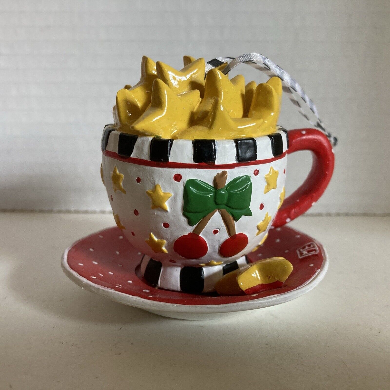 MARY ENGELBREIT Kurt Adler Christmas Collection Resin Ornament CUP of STARS OB