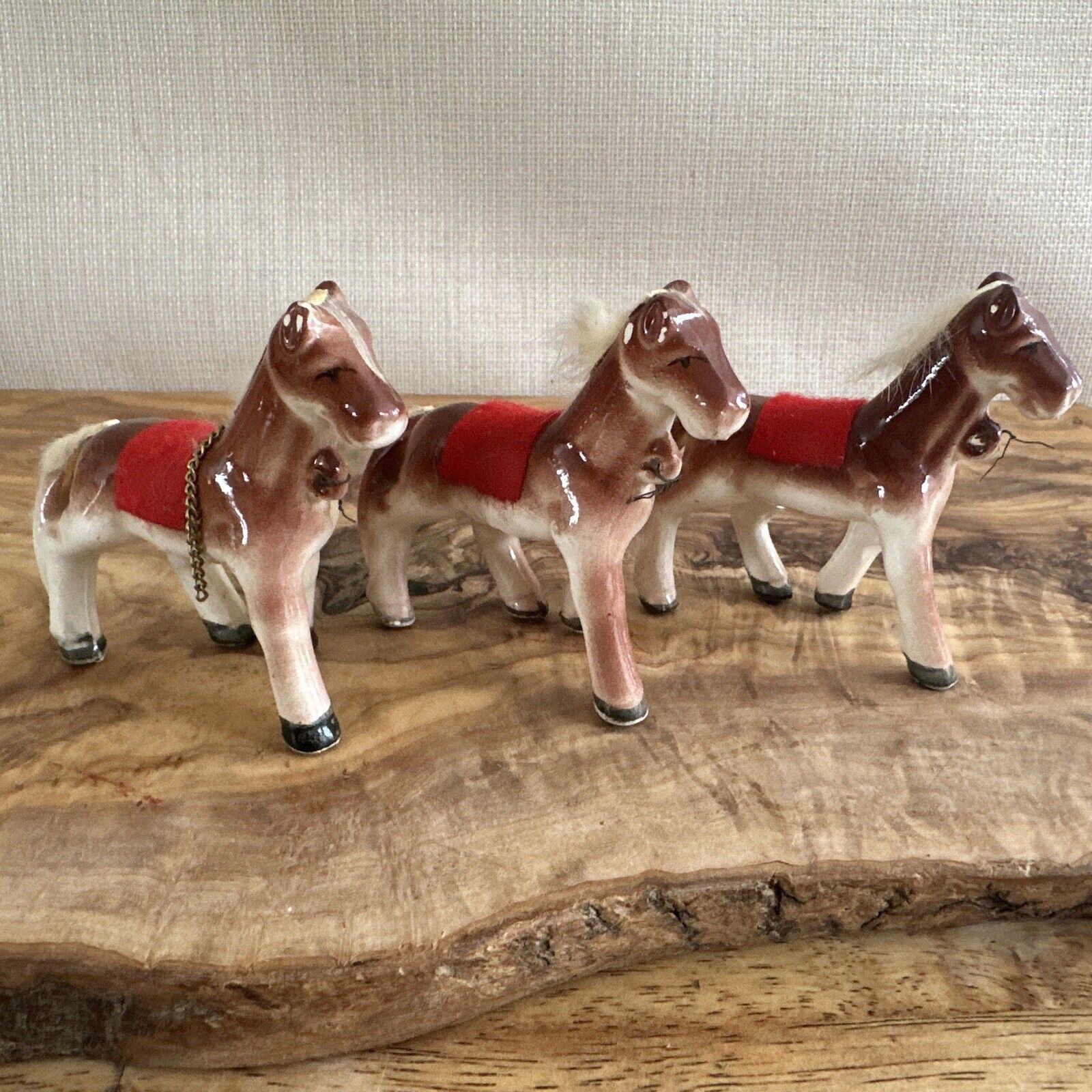Set Of Three vintage 3” ceramic horses from the 1950s-1960s Red Saddle & Fur