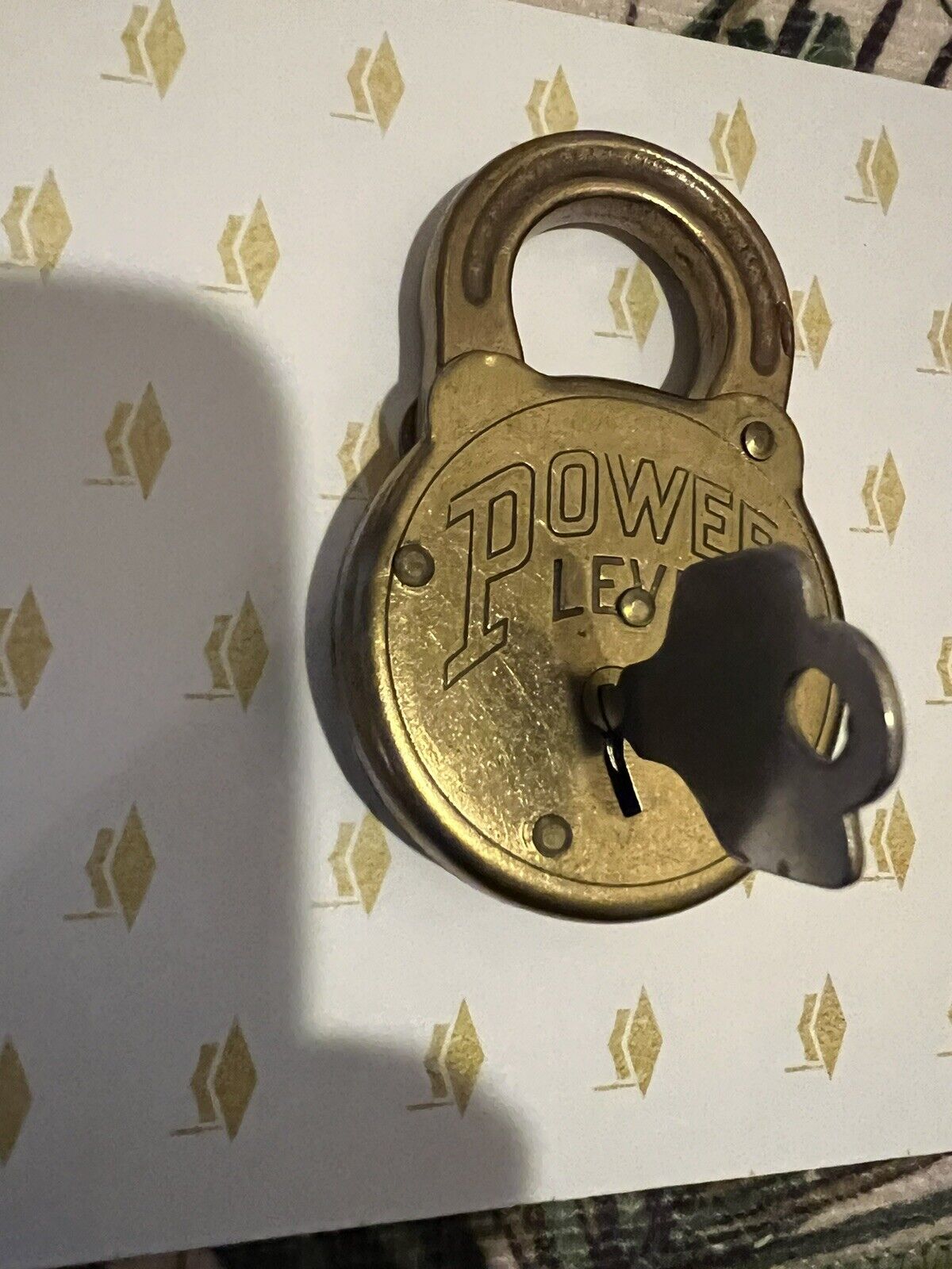 NOS VINTAGE POWER LEVER BRASS PADLOCK W/1 KEY BRAND NEW PAPER WRAPPED