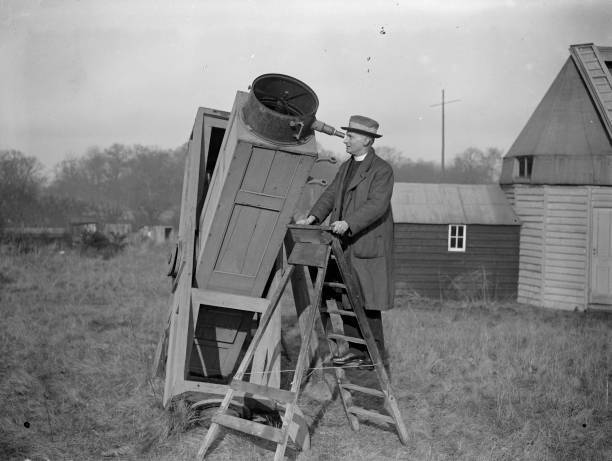Rev Phillips, President Royal Astronomical Society standing on a l- 1930s Photo