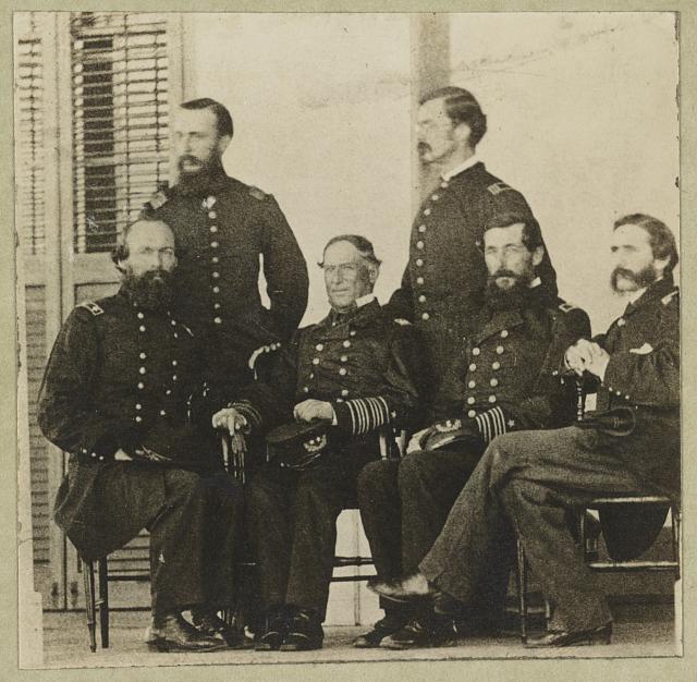 [Group portrait of officers with Admiral David G. Farragut seated, center]