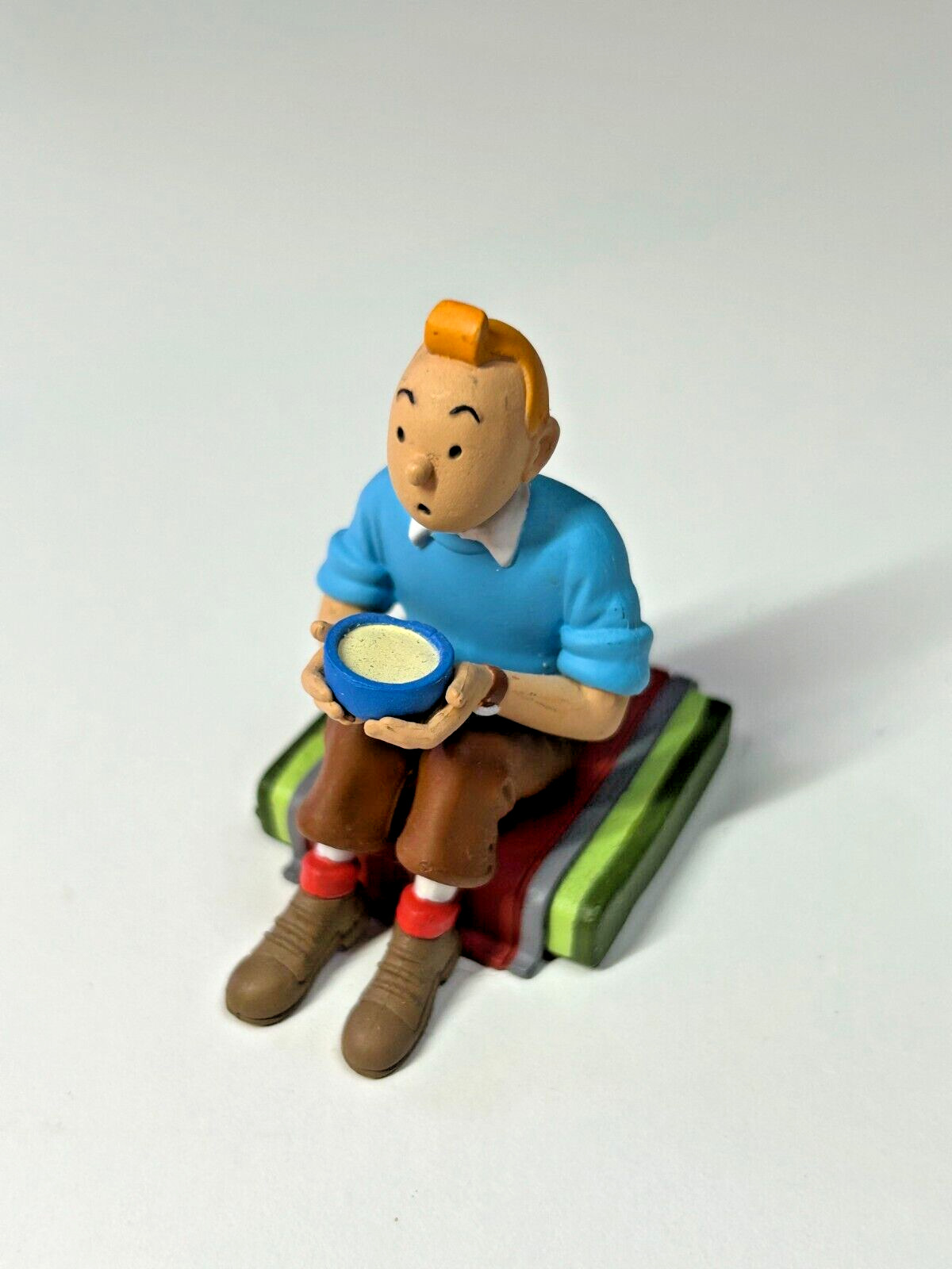 Tintin sitting with bowl figurine - Rare and out of production