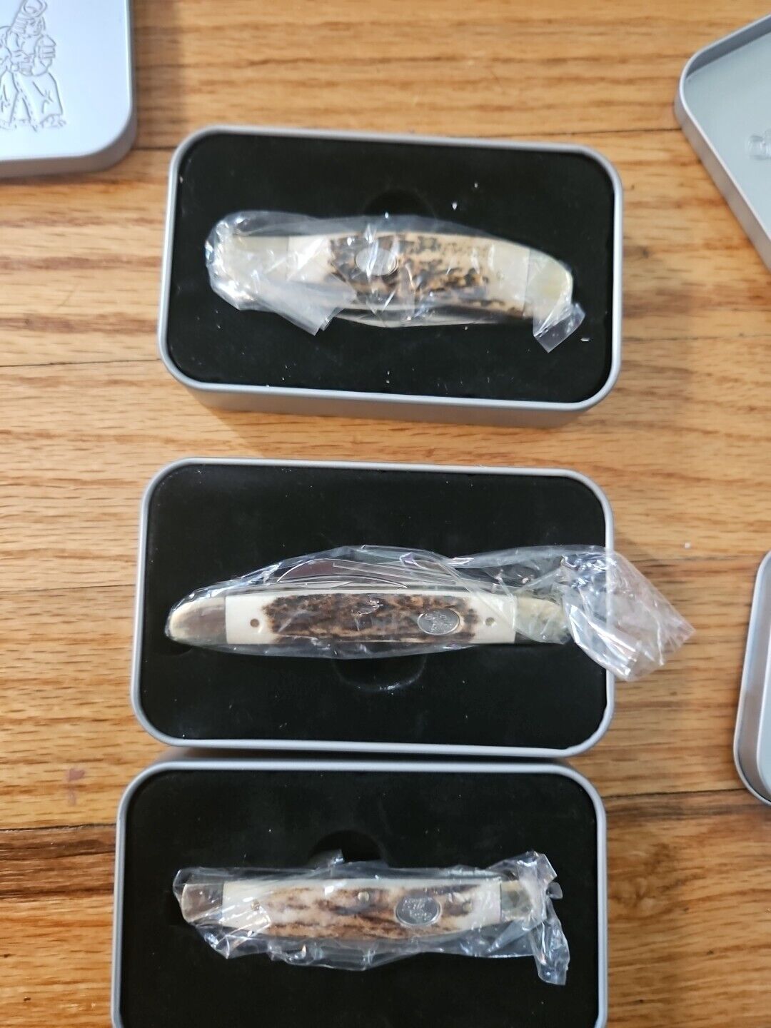 3 rare steel warrior pocket knives in collectors tins