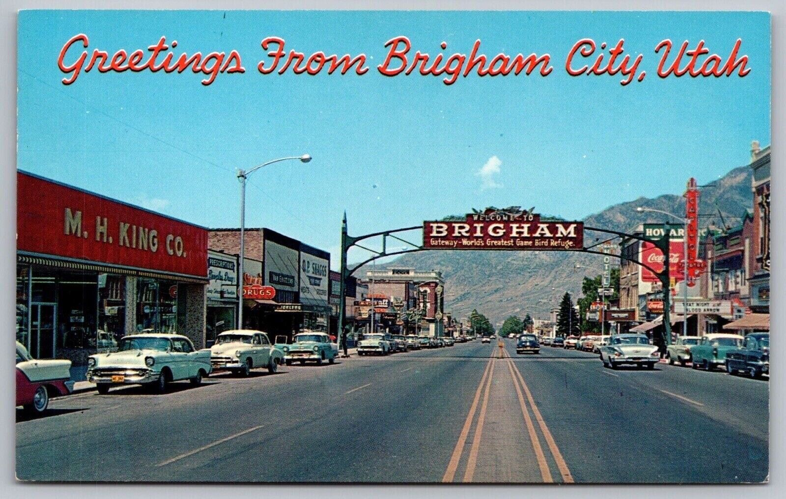Postcard Greetings Brigham City Utah Street View Old Cars Mountains Signs VNG