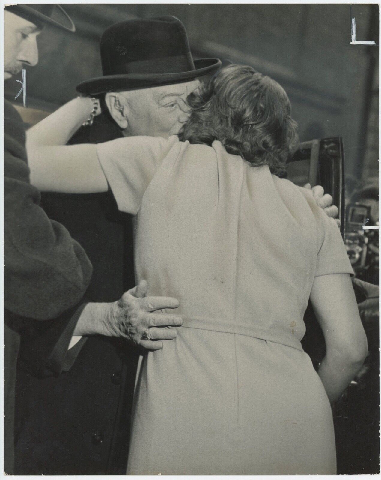 1 April 1963 press photo of Sir Winston S. Churchill, hugging his daughter