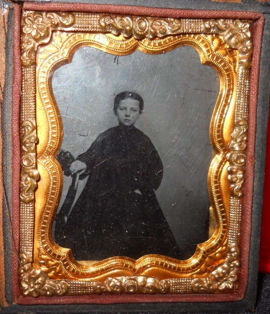 1/9th size Ambrotype of young girl on chair, half case