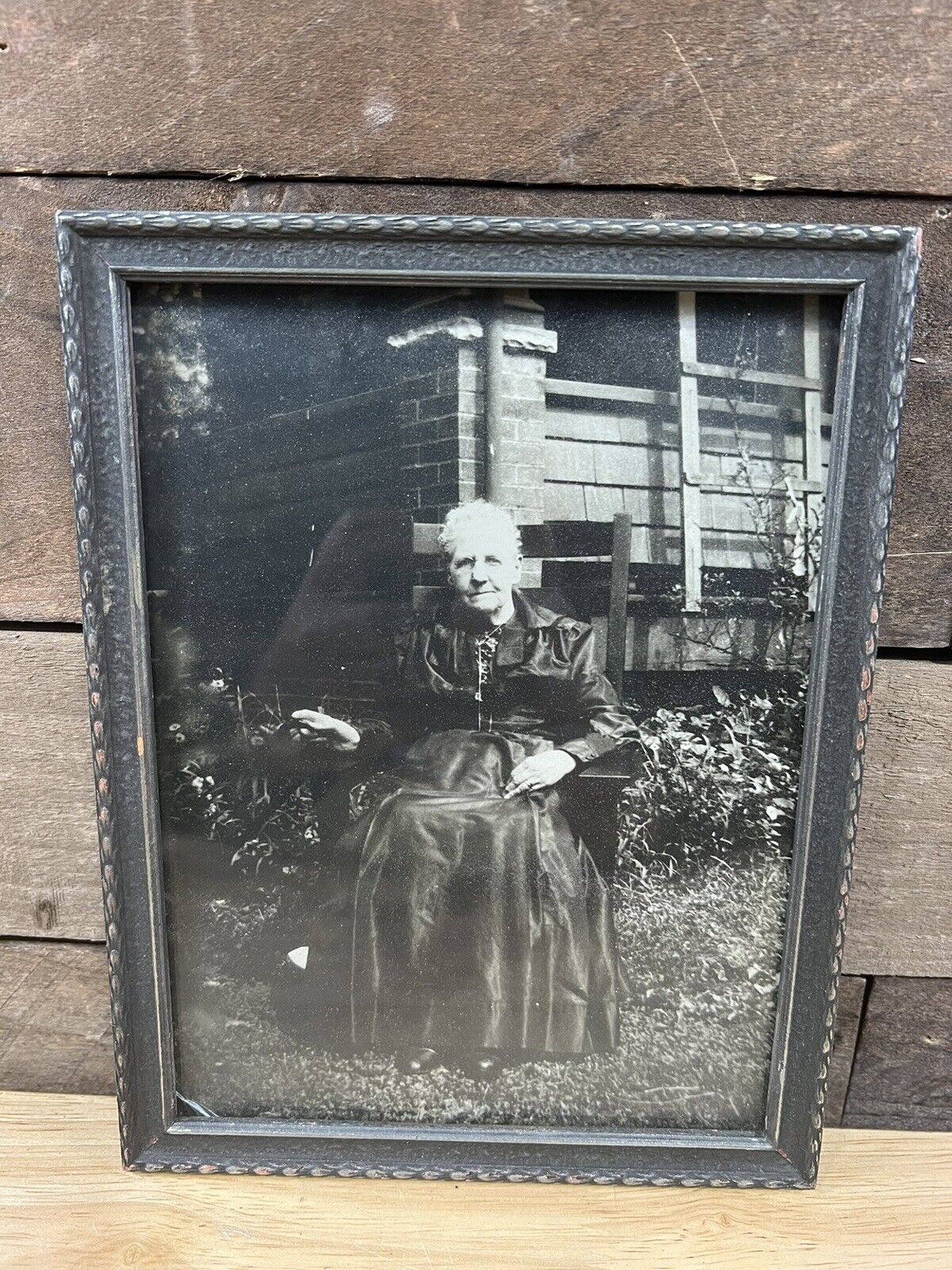 Antique Wood Frame Photo Of An Old Woman Sitting Outdoors