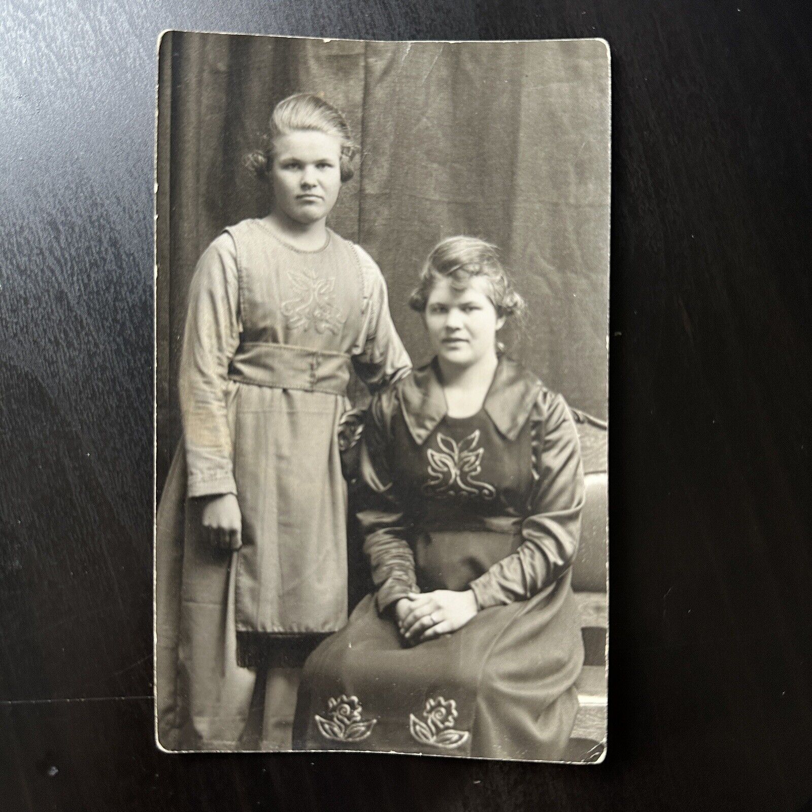 Postcard RPPC, Portrait 2 Young Women, 1 standing one seated, sisters