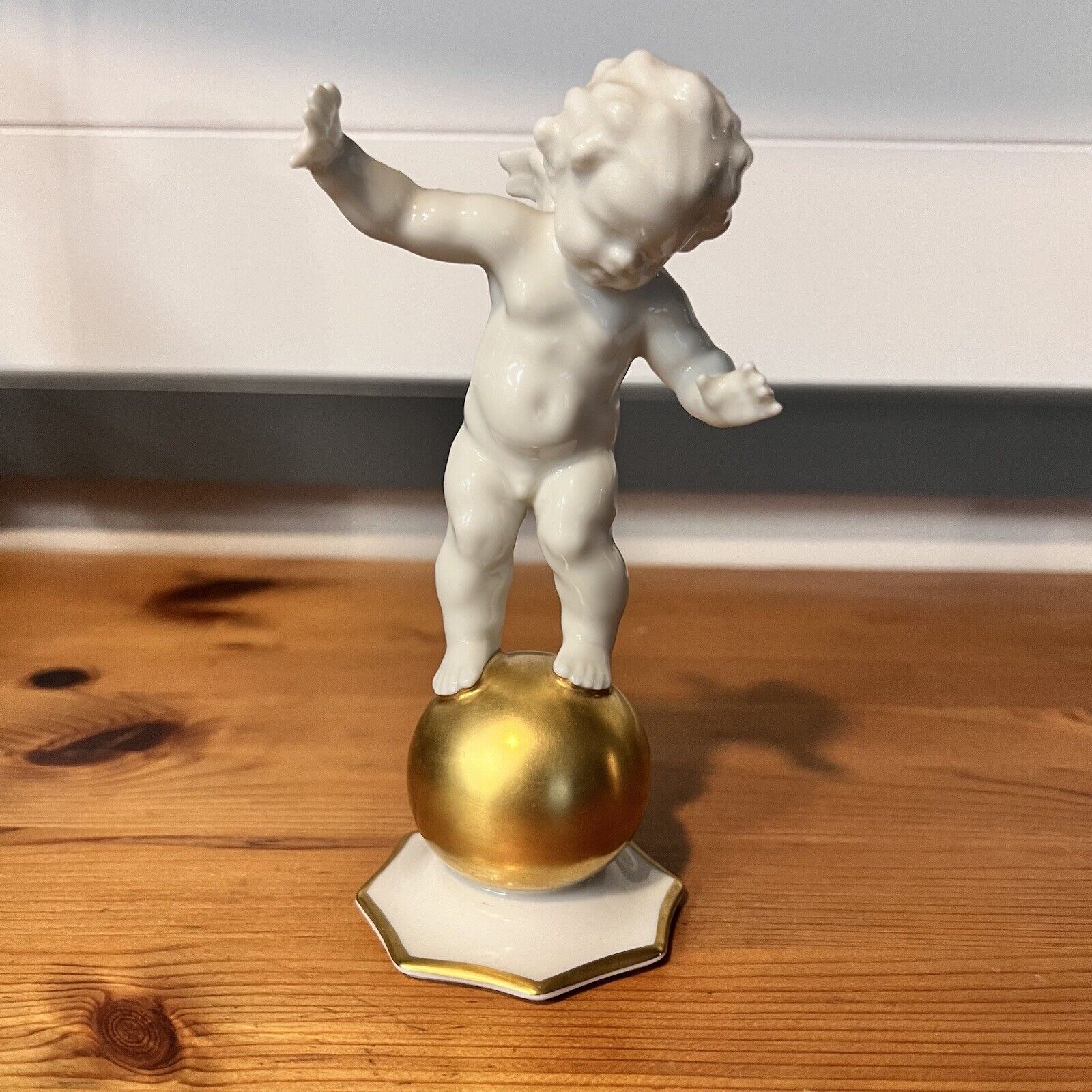 Hutschenreuter Cherub Balancing on Golden Ball Porcelain Figurine 1930s Germany