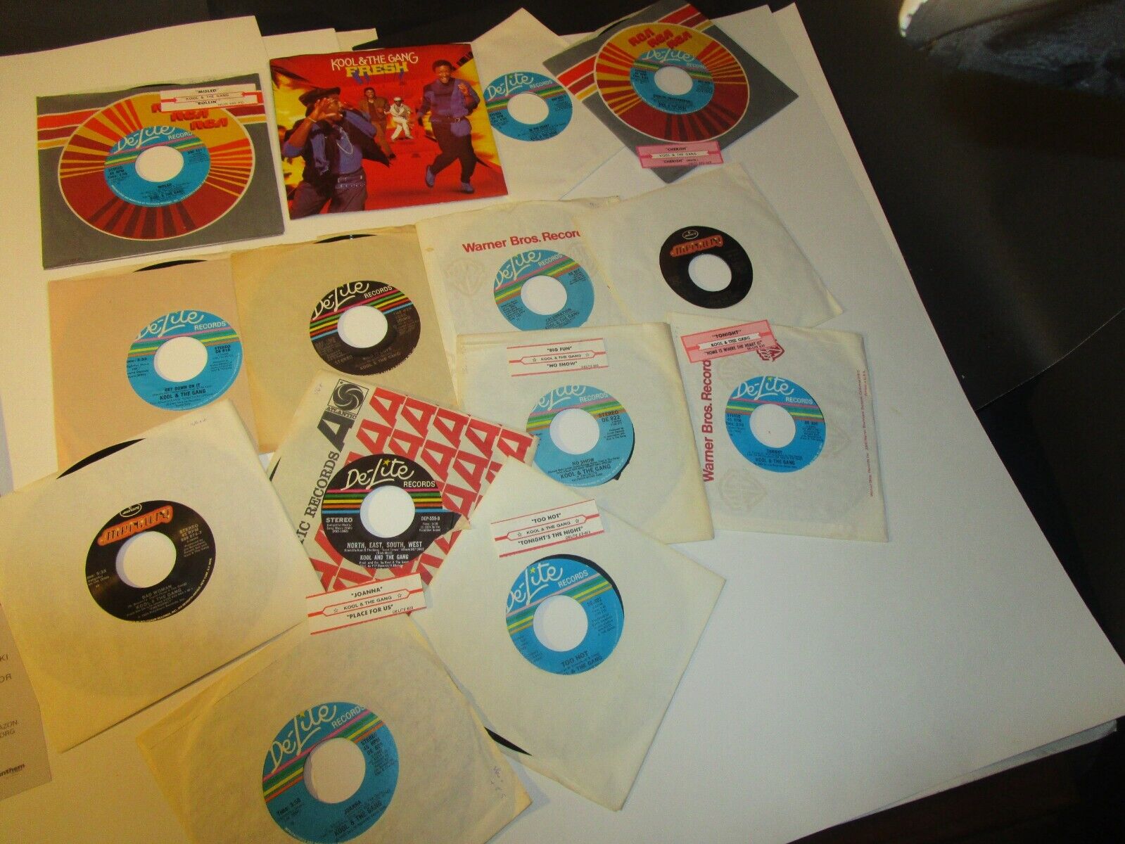 Lot of (13) Kool & The Gang 45 RPM Records -   VG+   INC 6 TITLE .STRIPS  NX28