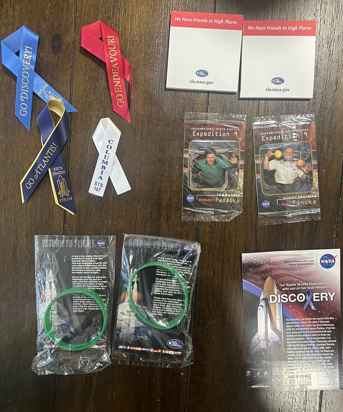 Lot Of Official NASA items Including Ribbons, Sealed Discovery Bracelet And Card