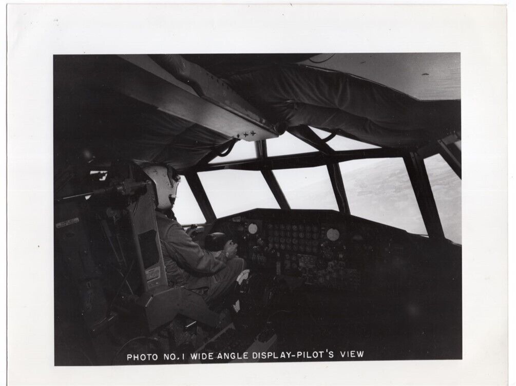 1980s Pilot in Cockpit of Large Unknown Aircraft 8.5x11 Original Photo