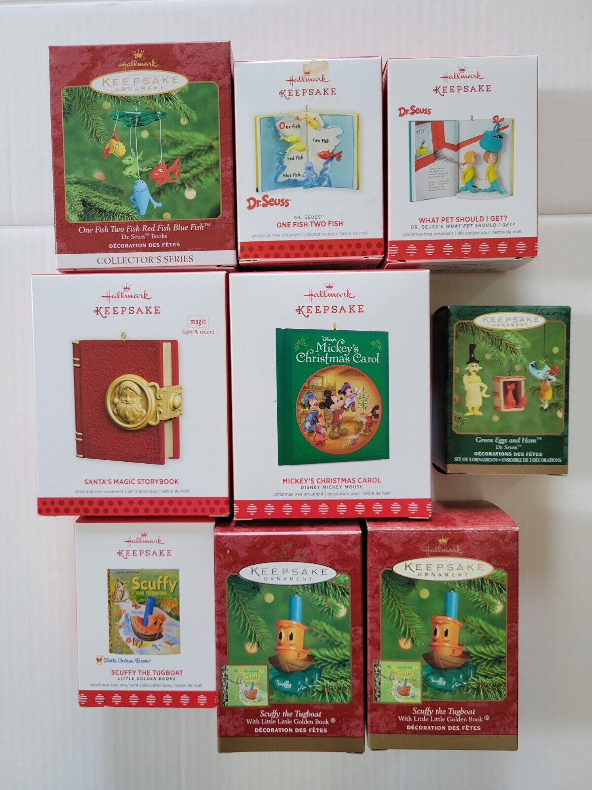 Lot of 9 Hallmark Storybook Ornaments - Dr. Seuss, Scuffy Tugboat, Mickey Mouse