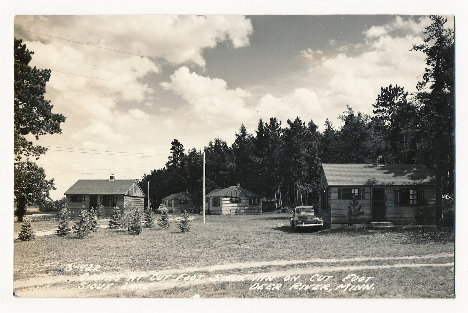 Cabins at Cut Foot Sioux Inn, Deer River, Minnesota 1940's RPPC