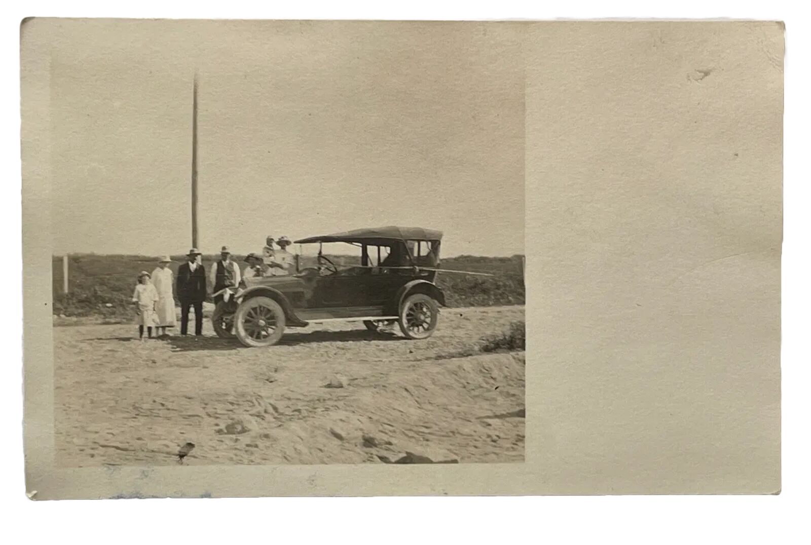Postcard Photo RPPC Antique Car Men Women Children Posing Automobile Auto