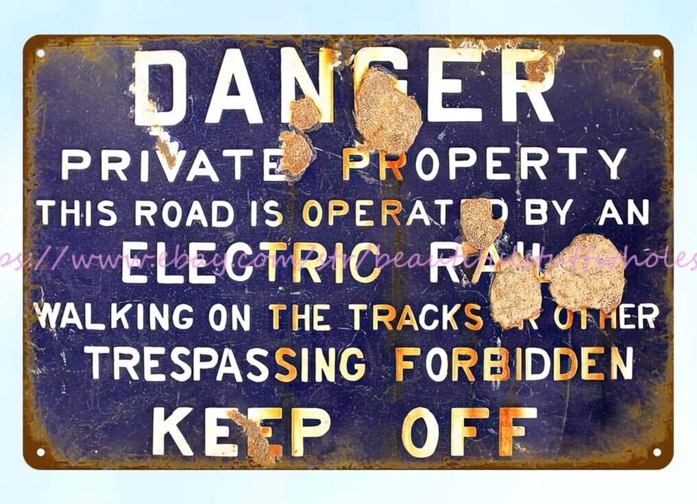Danger trespass forbidden keep off Northern Electric Railroad train track sign