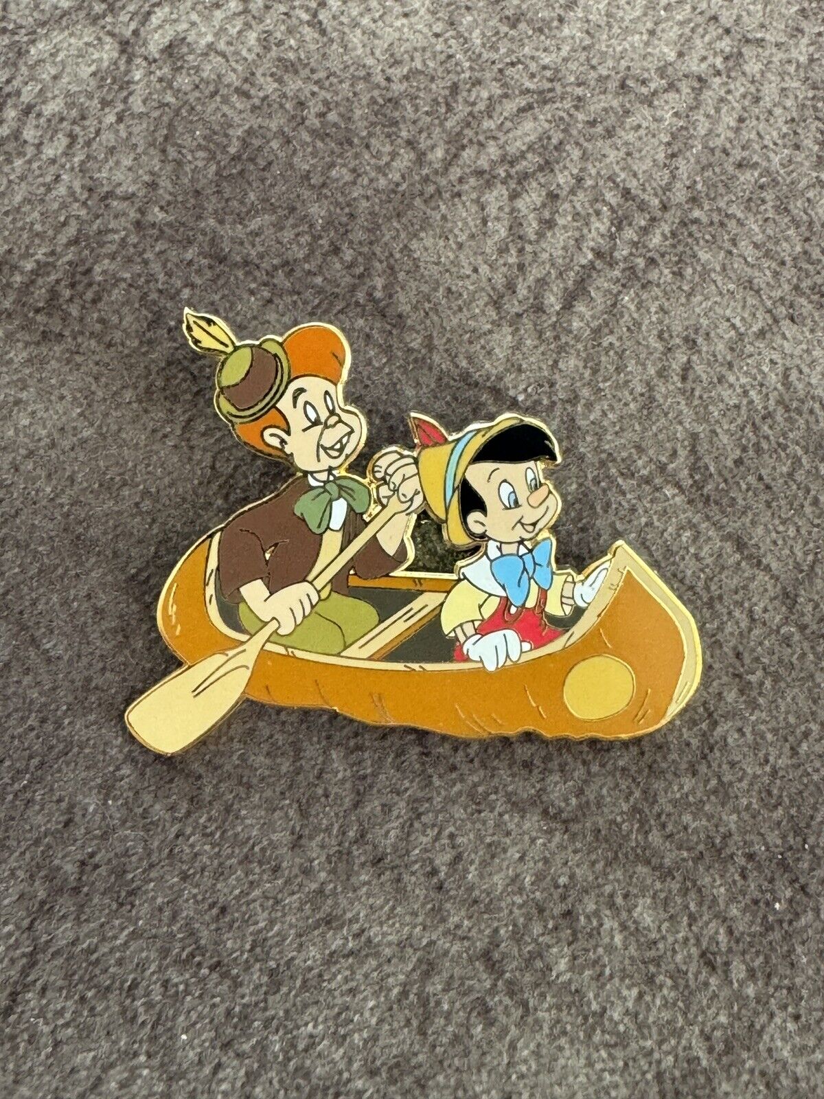 A Family Pin Gathering Pinocchio and Lampwick in Canoe Boat Disney Pin LE 200