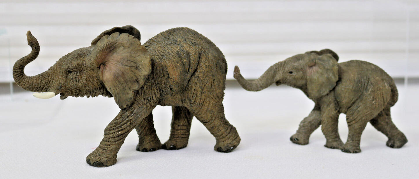 Elephants Figurines Pair African Running Junenile Trunk Raised Graite Gray