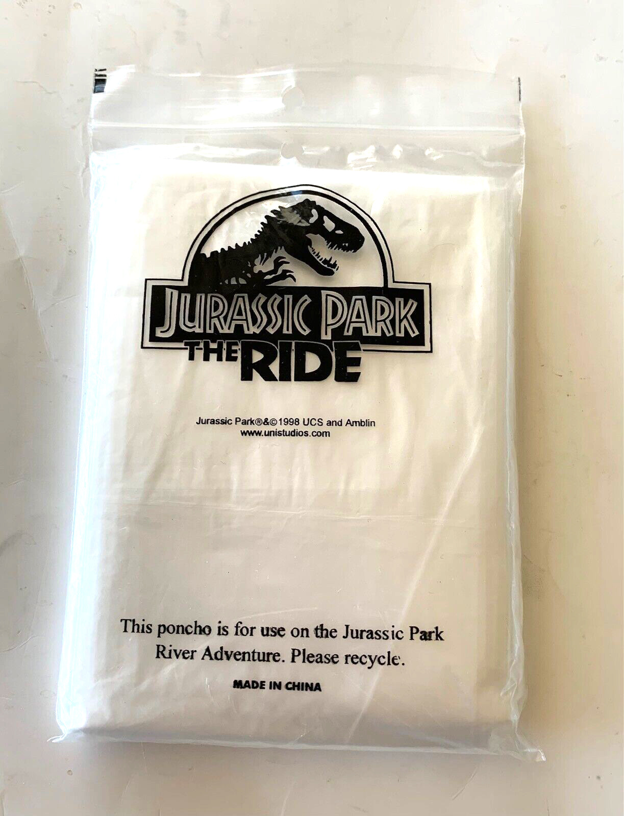 Jurassic Park The Ride 1998 Plastic Poncho NEW Clear Unused.