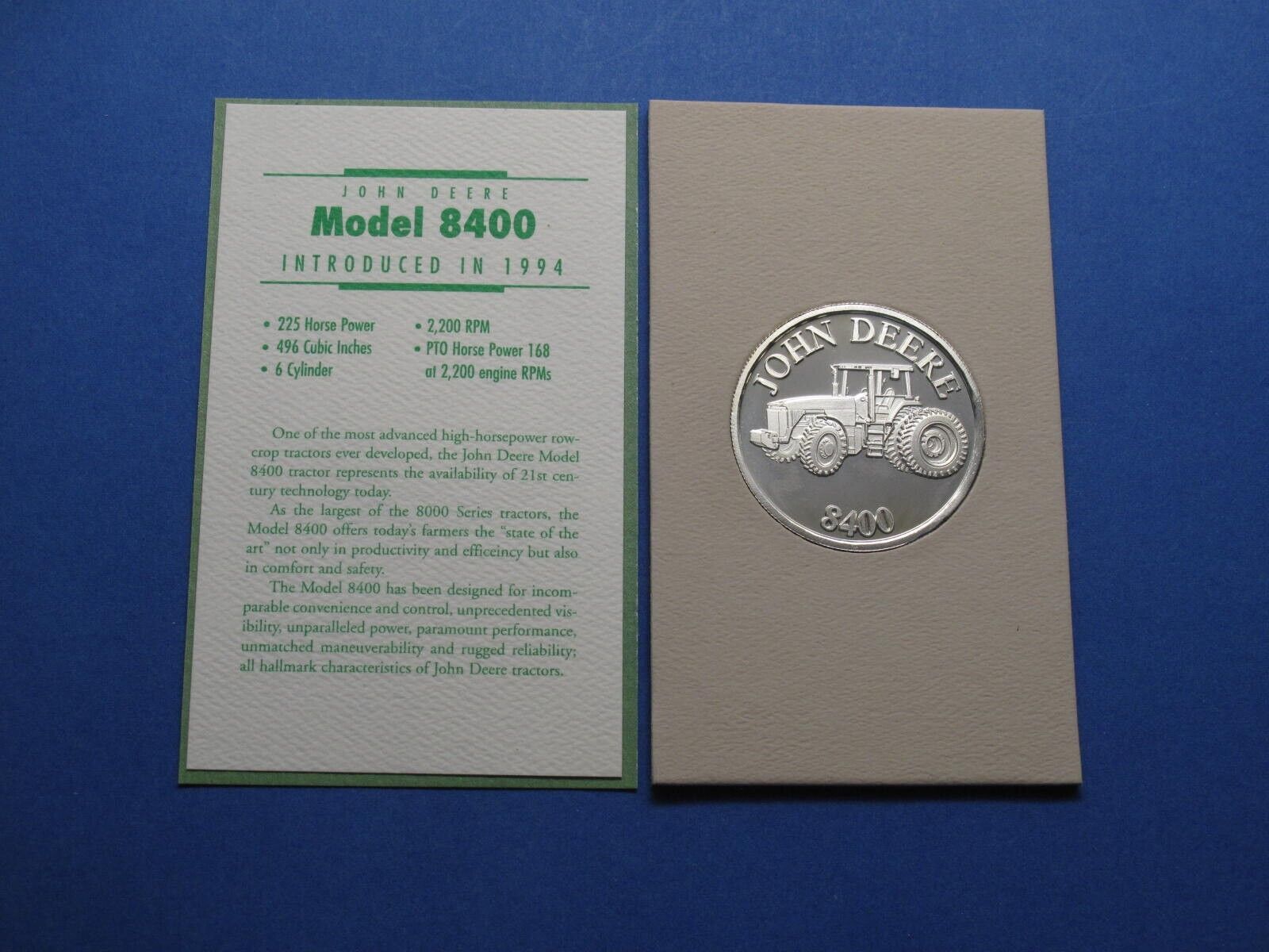 John Deere 1994 Model 8400 Tractor Silver Round in Case with Story 1 oz 999 Fine