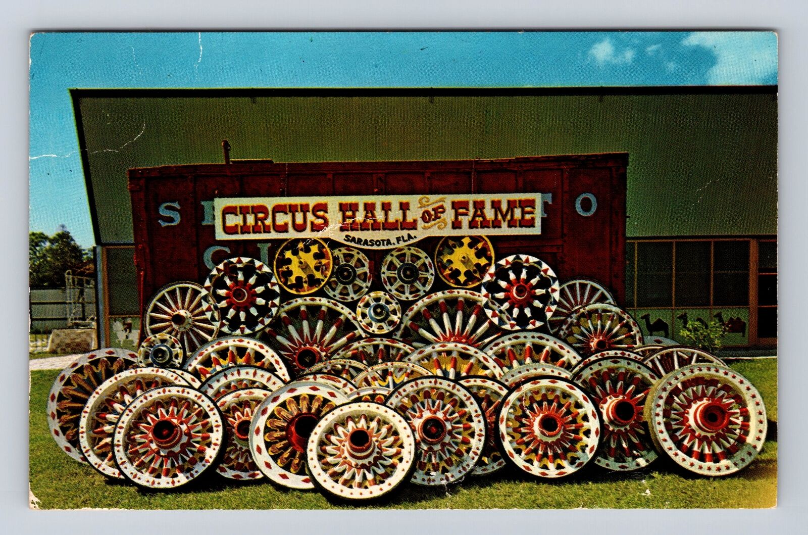 Sarasota FL- Florida, Sunburst Wheels, Antique, Vintage Souvenir Postcard