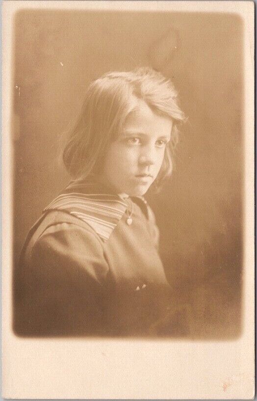 c1910s RPPC Real Photo Postcard Serious-Looking Girl /  Studio Portrait - Unused