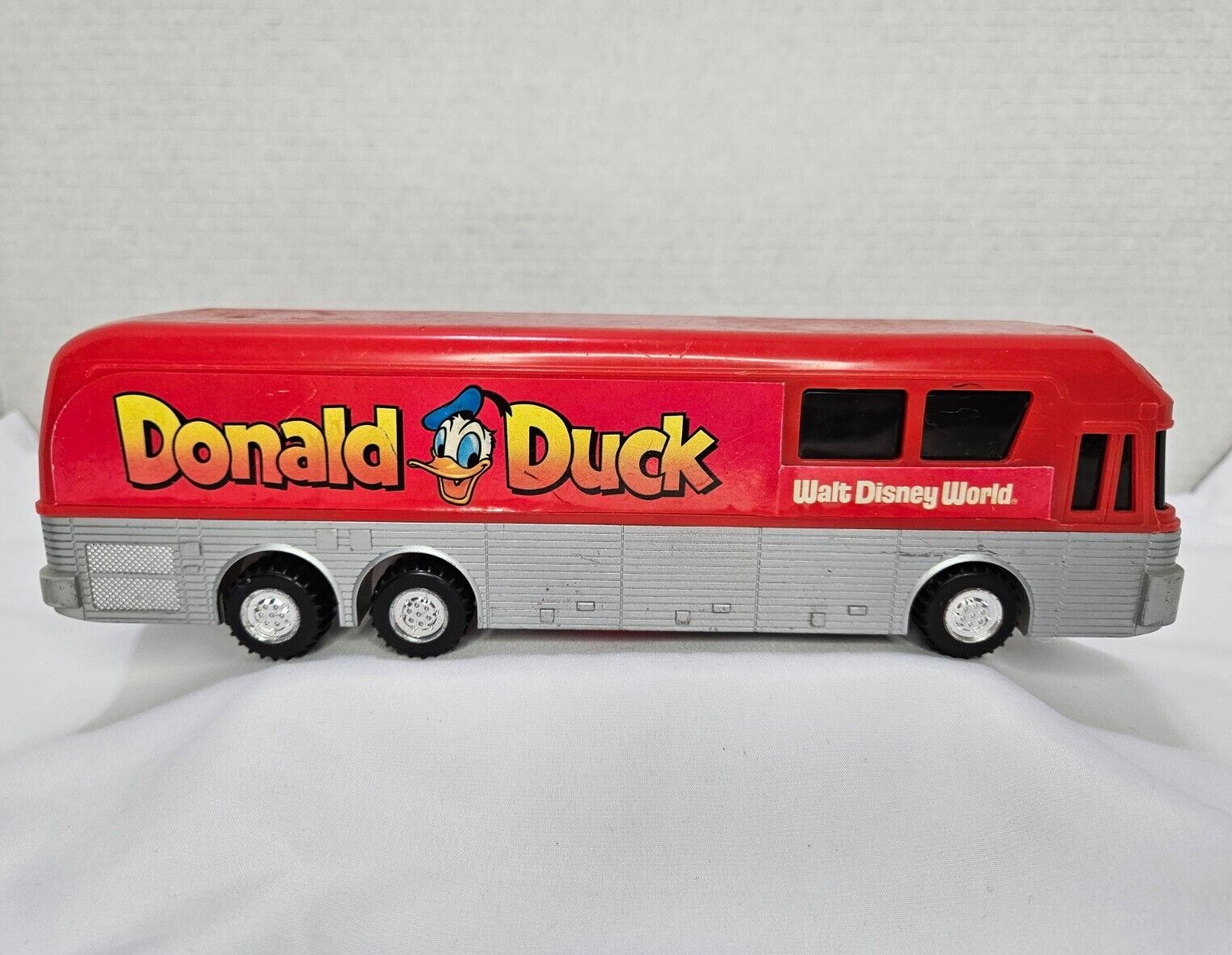 Vintage Walt Disney World Donald Duck Red And Silver Bus Toy