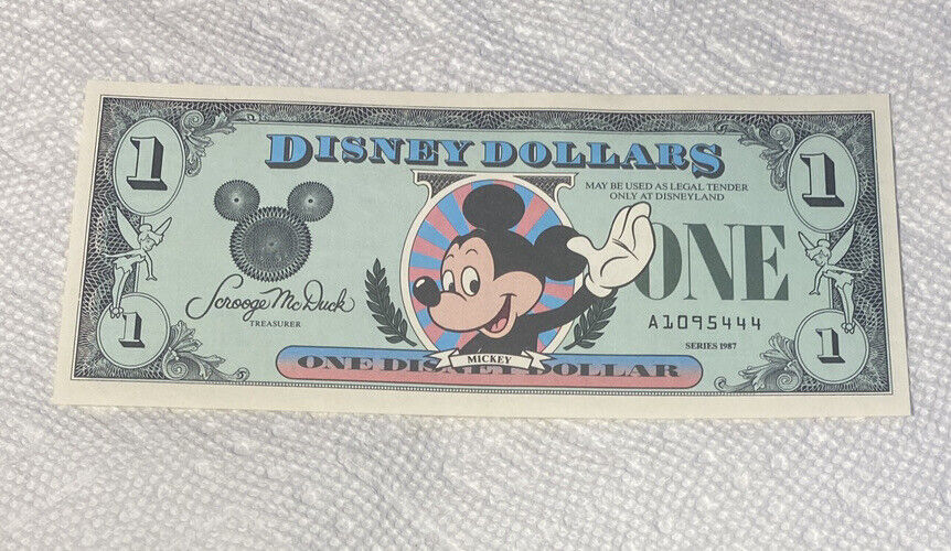 1987-A $1 Disney Dollar. First Issue. Disneyland. Mickey Mouse. CU.