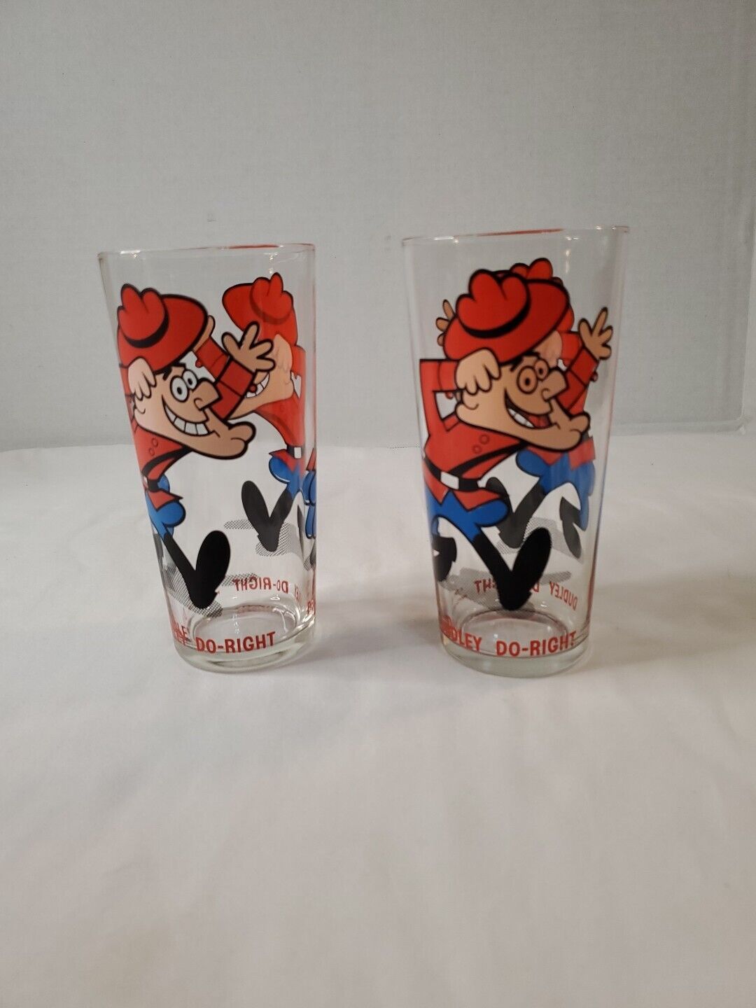 Pair Of Rare Late 70\'s P.A.T Ward Dudley Do-Right Red Letter Series Glass 6 1/2\