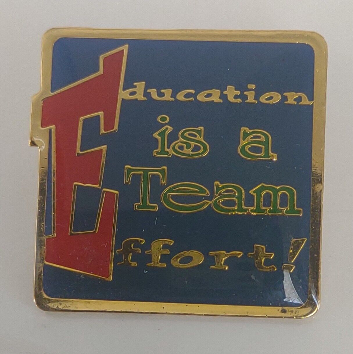 Education is a Team Effort Lapel Pin