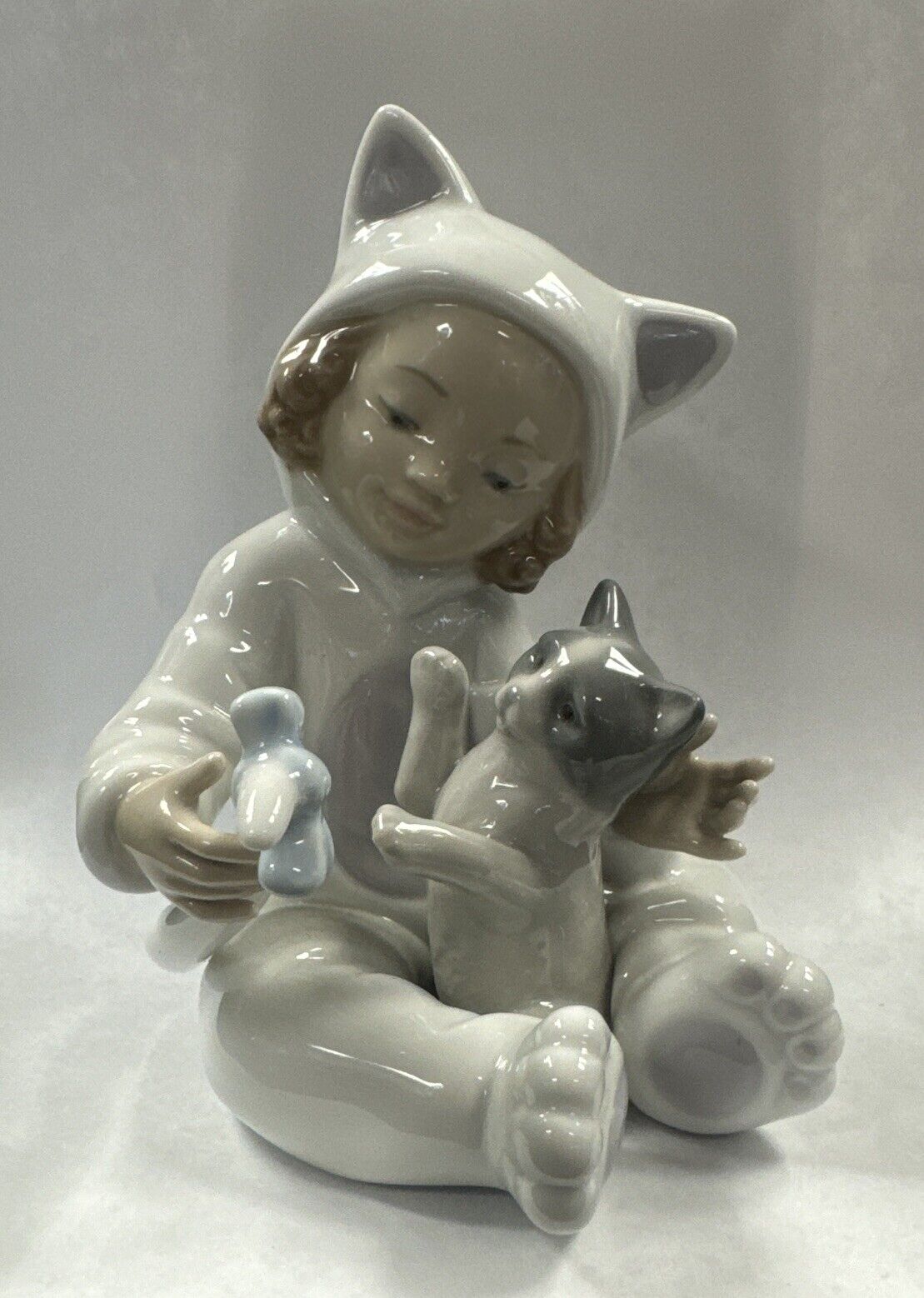 2010 Lladro Girl Sitting w/ Cat Costume \