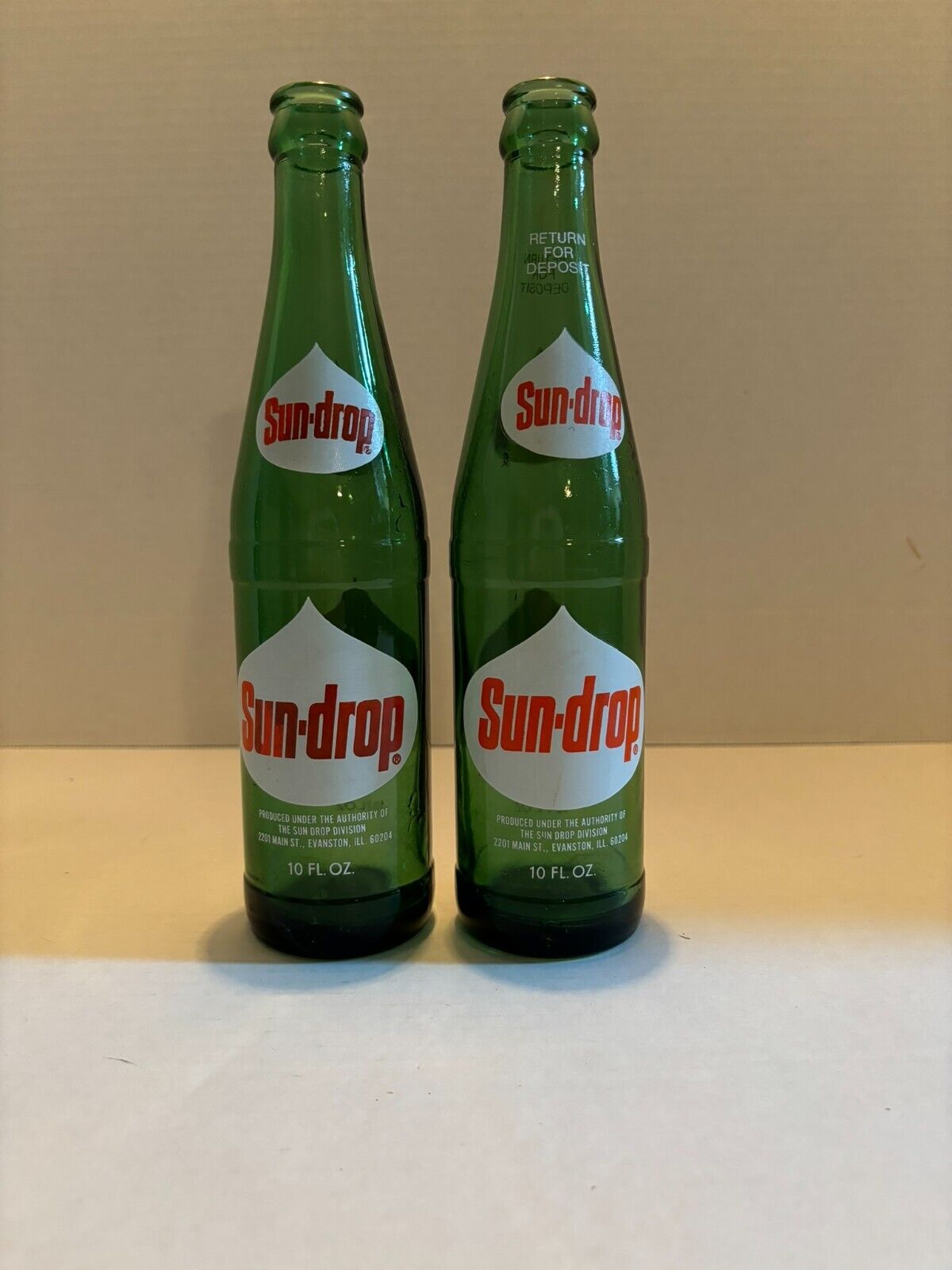 Vintage Pair of Green Sundrop 10 fluid oz. Bottles