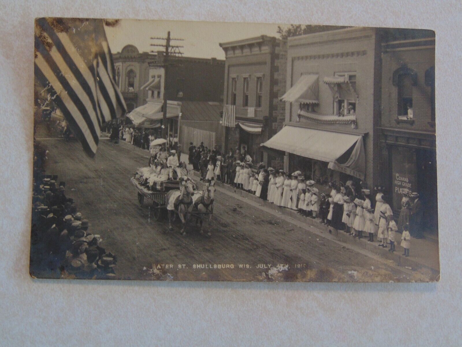 C1095 Postcard RPPC WI Wisconsin Shullsburg Parade Down Water Street St Scene