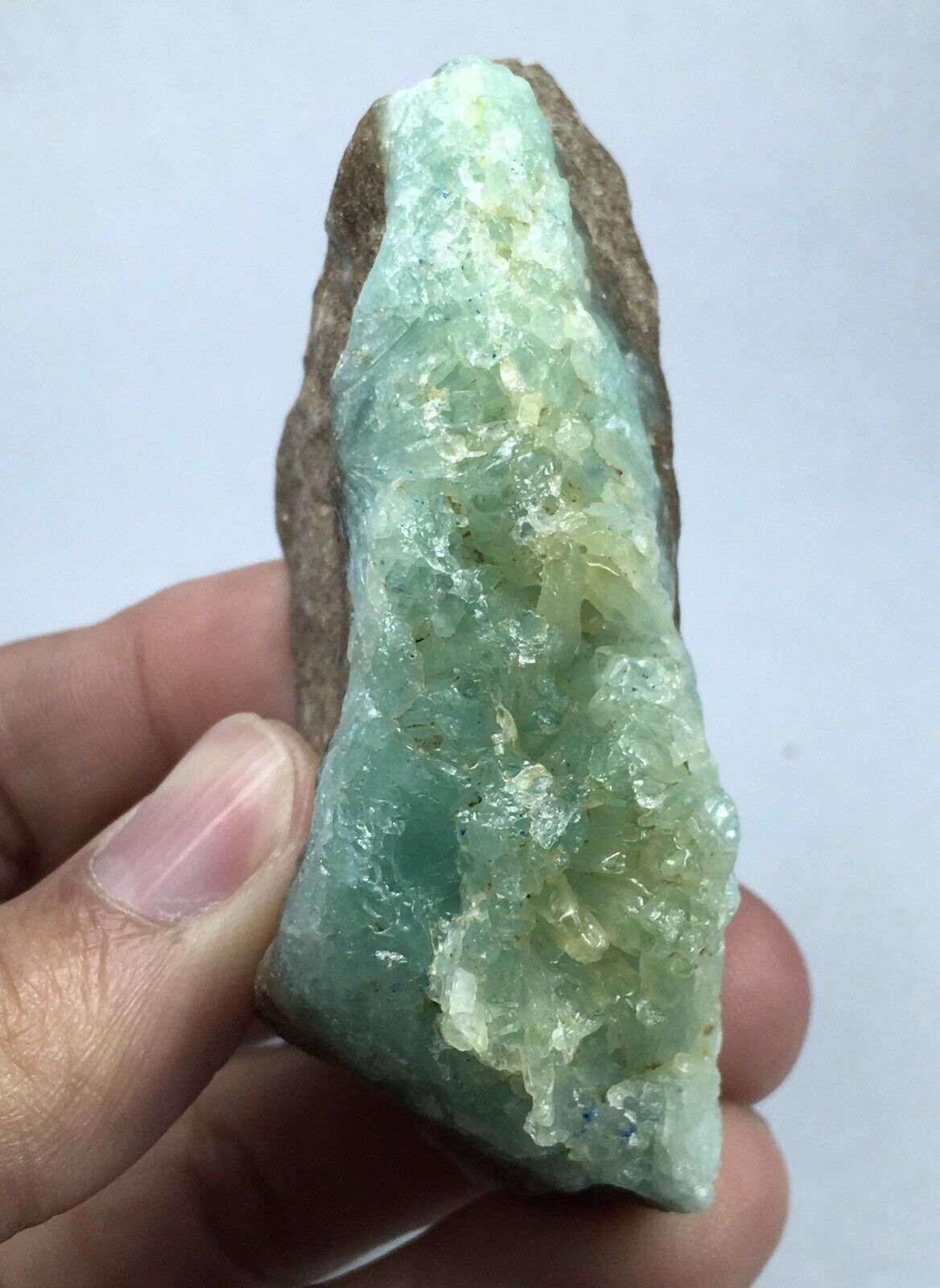 Bluish Green Aragonite crystal on matrix