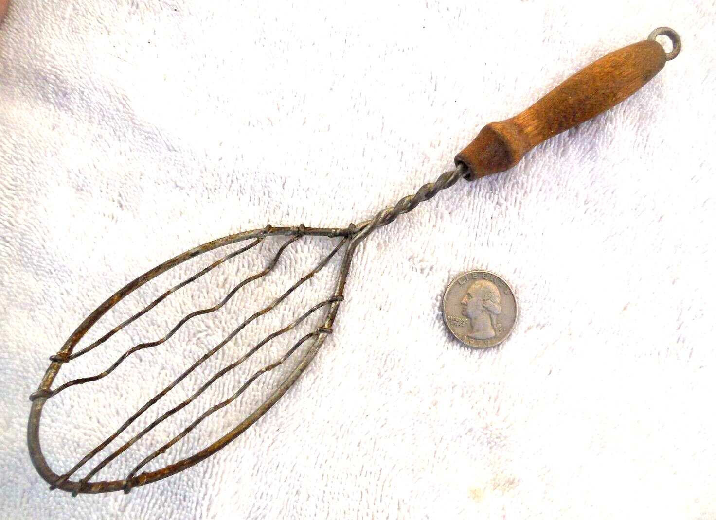 Old hand-held whisk egg beater whipper with wavy beater wires circa early 1900\'s