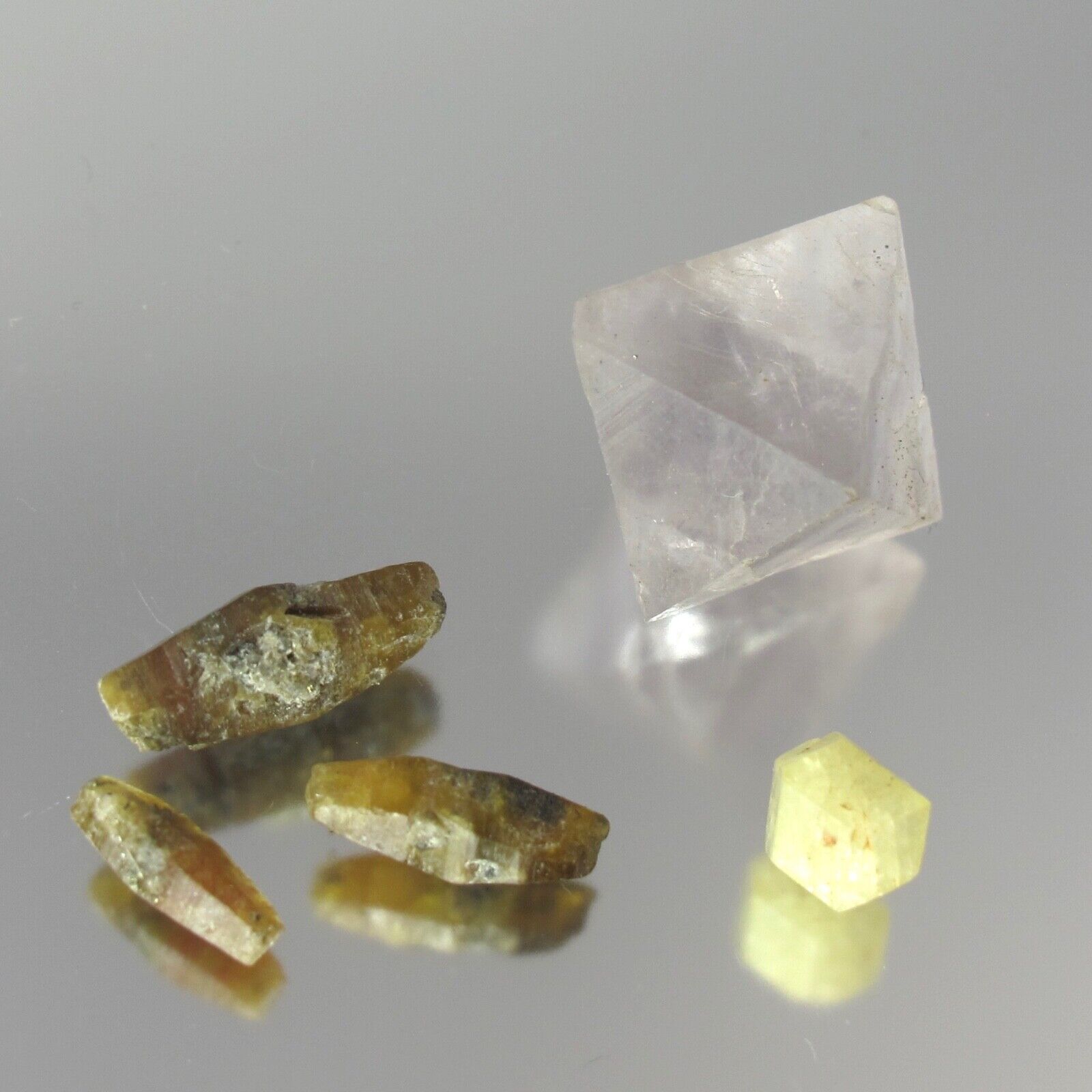 lot 5 floater crystals: double terminated dogtooth corundum, fluorite, rhodizite