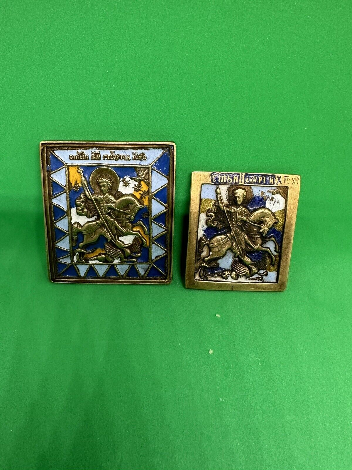 Two 19th century Orthodox Bronze enameled ICONS  of  Saint George the Victorious