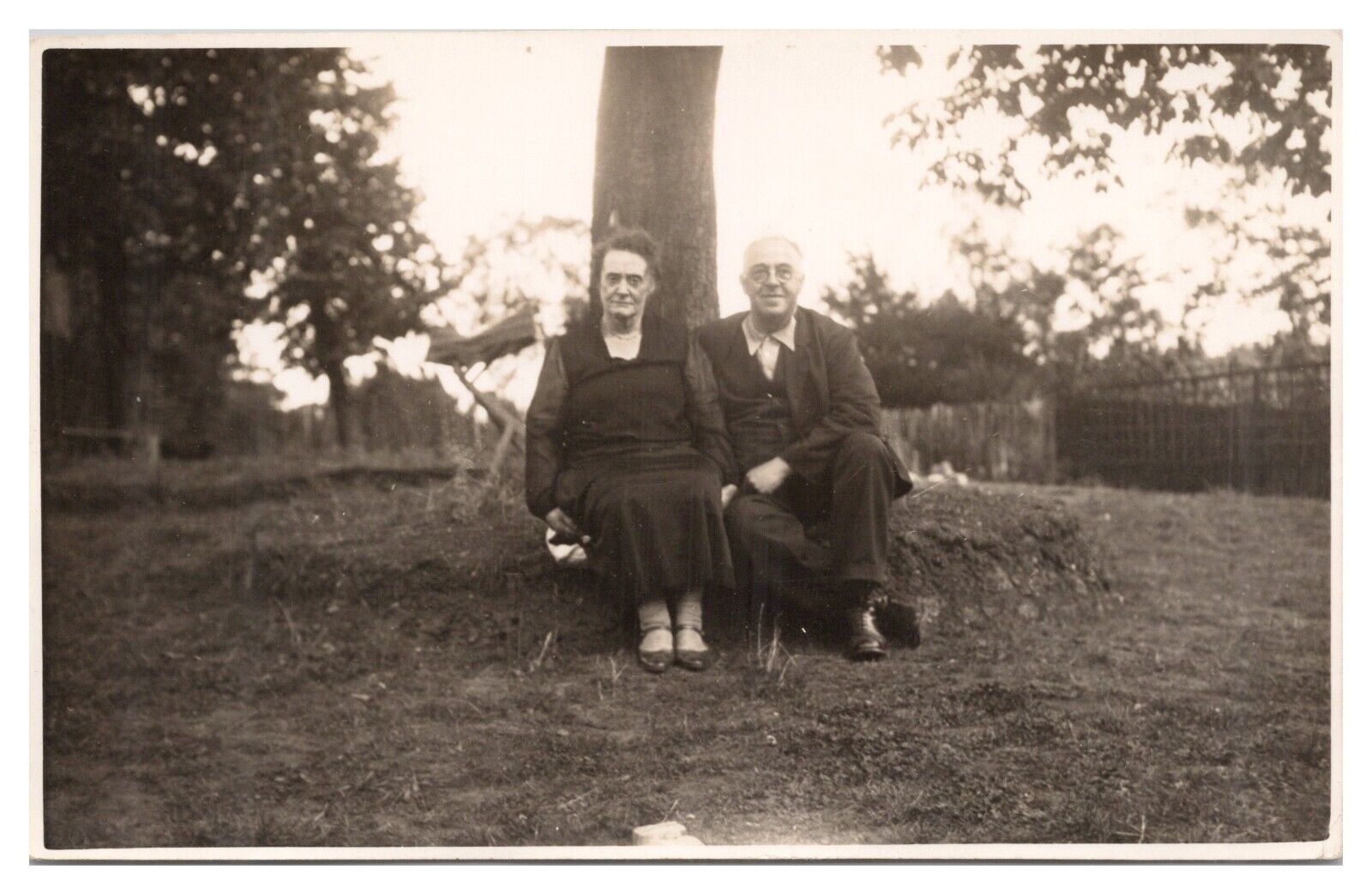 RPPC Random Older Couple Sitting under Tree Postcard Real Photo Unposted