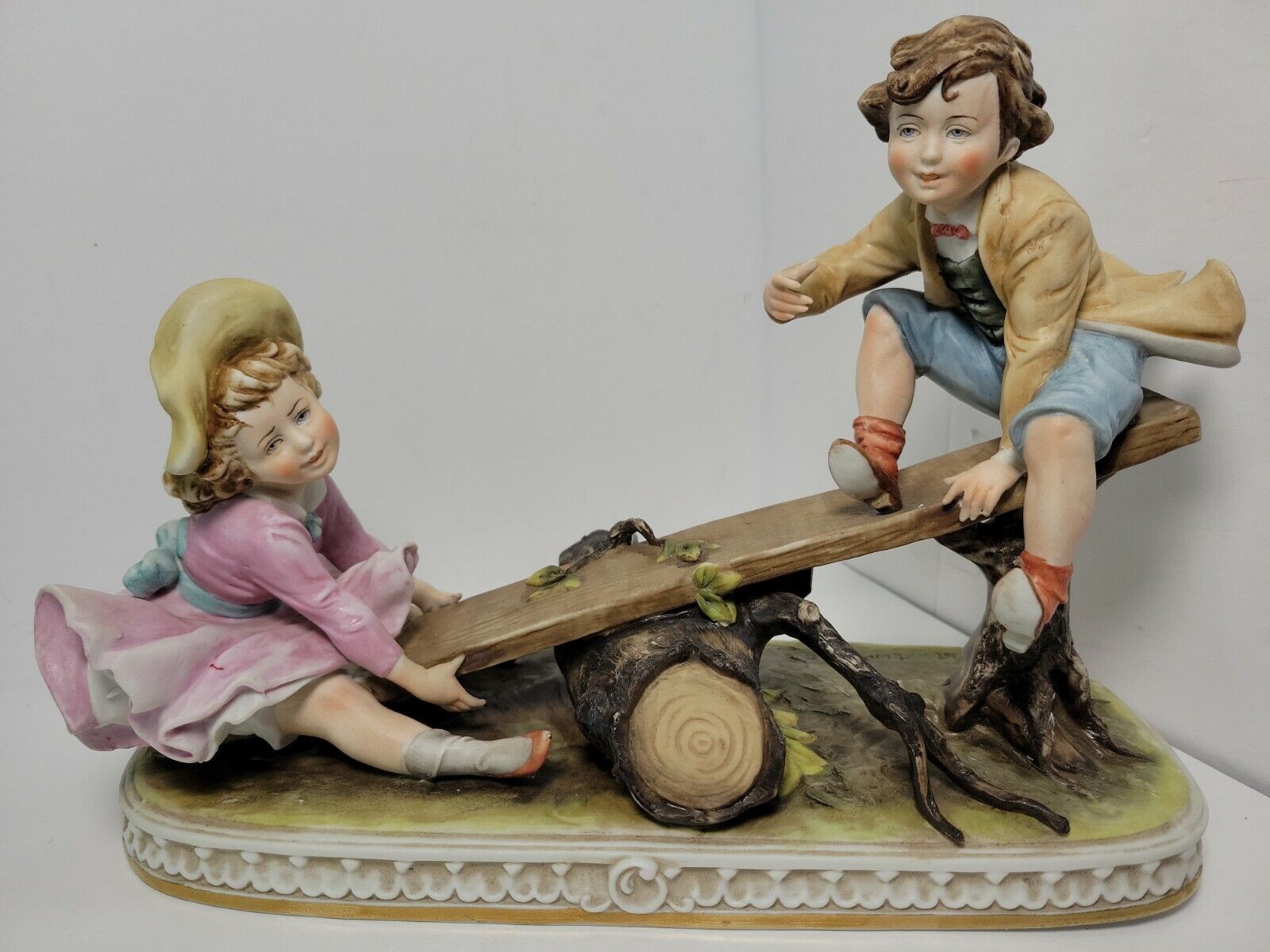 Vintage Capodimonte signed by B. Martino Boy & Girl on a Seesaw Figurine 