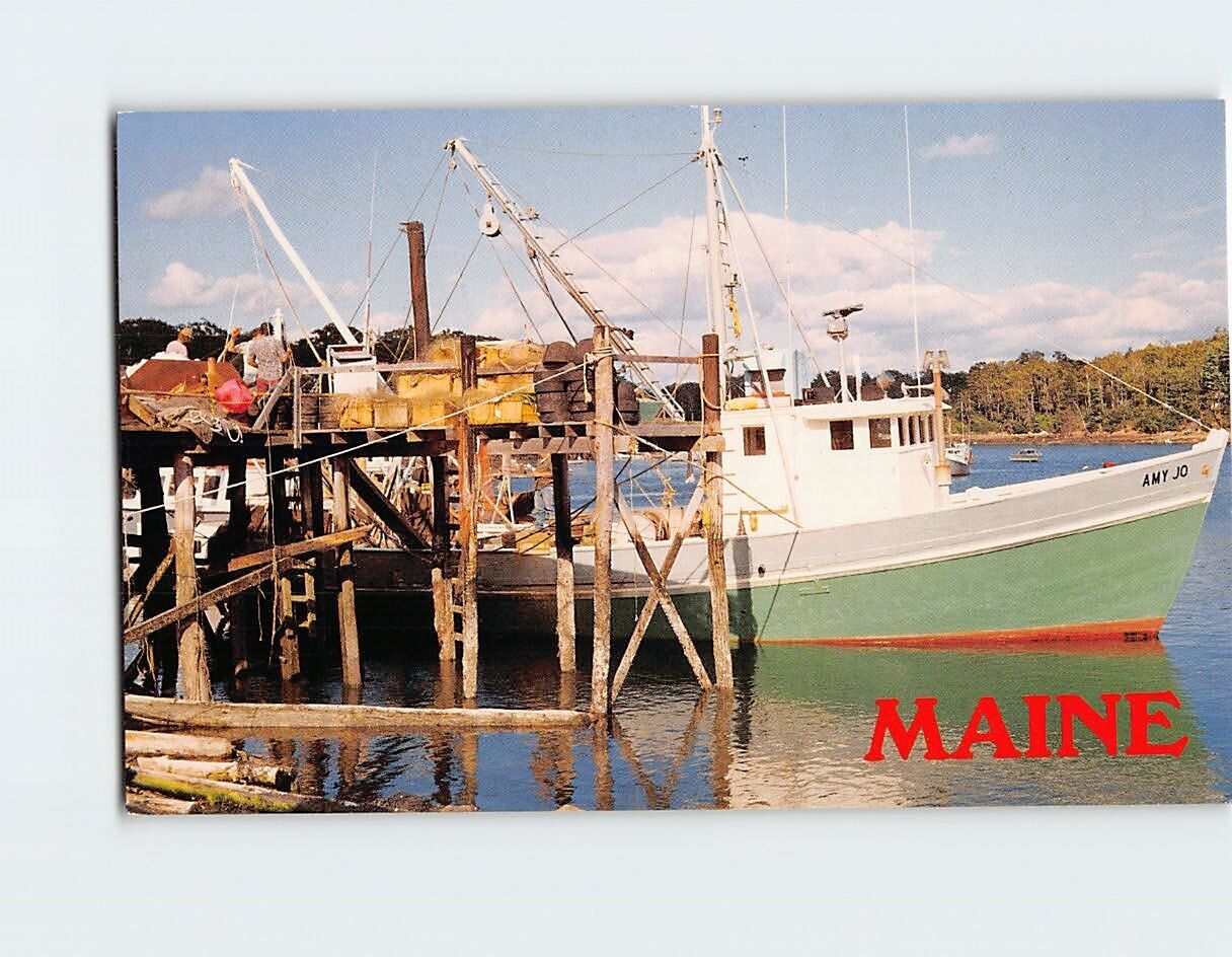 Postcard View of a fishing boat being unloaded South Bristol Maine USA